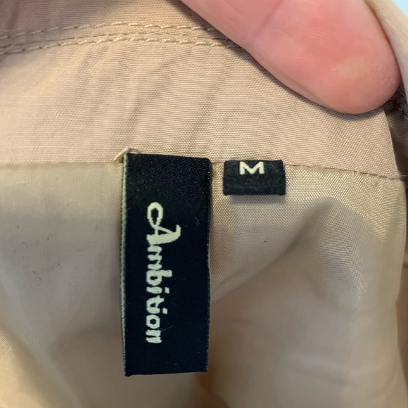 Trench coat with puff sleeves - Picture 10 of 10